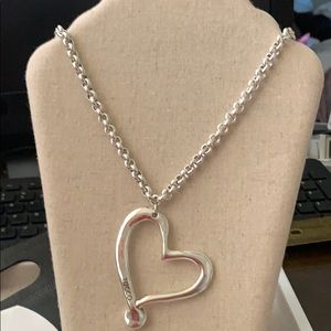 TUCCO HEART PENDANT IN A 34” CHAIN IN SILVER PLT
